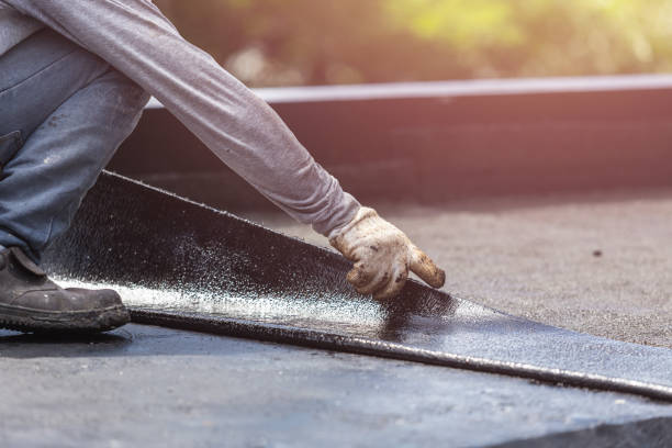 Professional Exterior Waterproofing technician working in Burlington, OH
